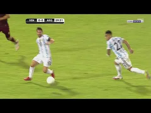 Lionel Messi survives a horrific tacke from Adrian Martinez
